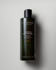 MÁDARA Organic Skincare nourish and repair shampoo A4001 shampoo product photo on plain background.